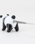 Flat-tip metal dabber tool extending from Empire Glassworks Panda handle for precise concentrate use