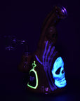 Haunted Gourd enamel on oil dab rig glowing under blacklight