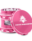 Pink herb grinder with 'Kozo Grinders' logo on a white background