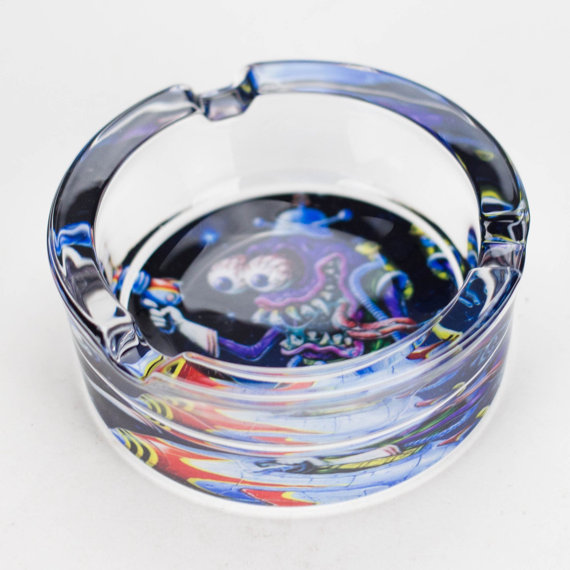 Cartoon-design glass ashtray on a white background