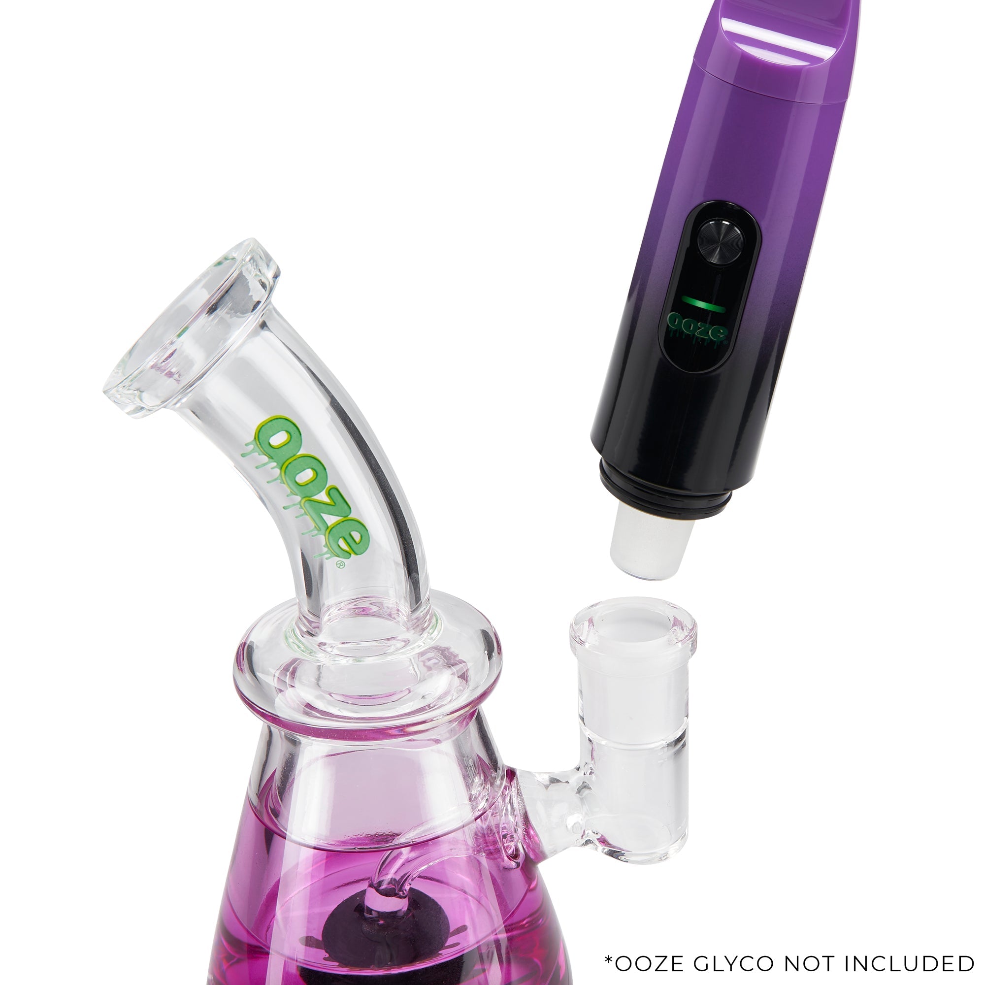 Galaxy Purple Ooze Booster Extract Vaporizer attached to a glass bong for use