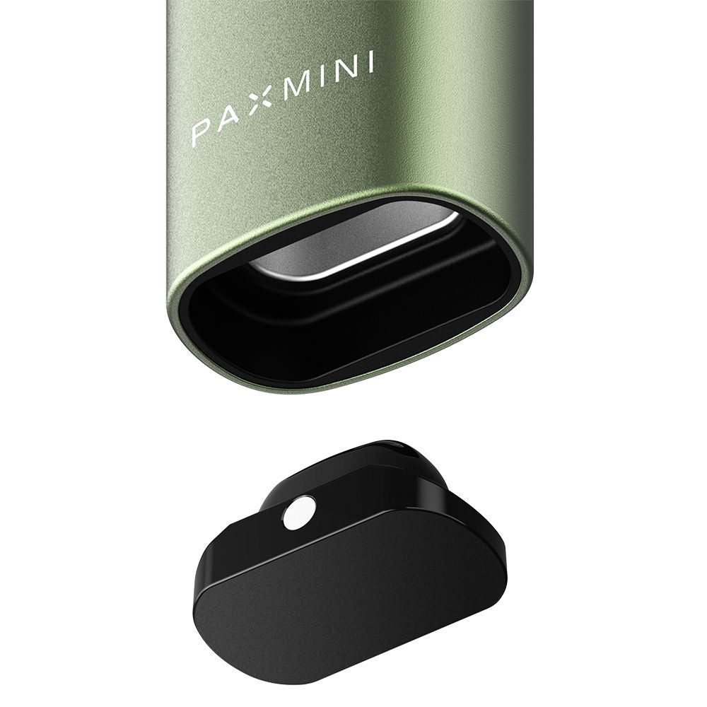 Green Pax Mini device with black cap on a white background
