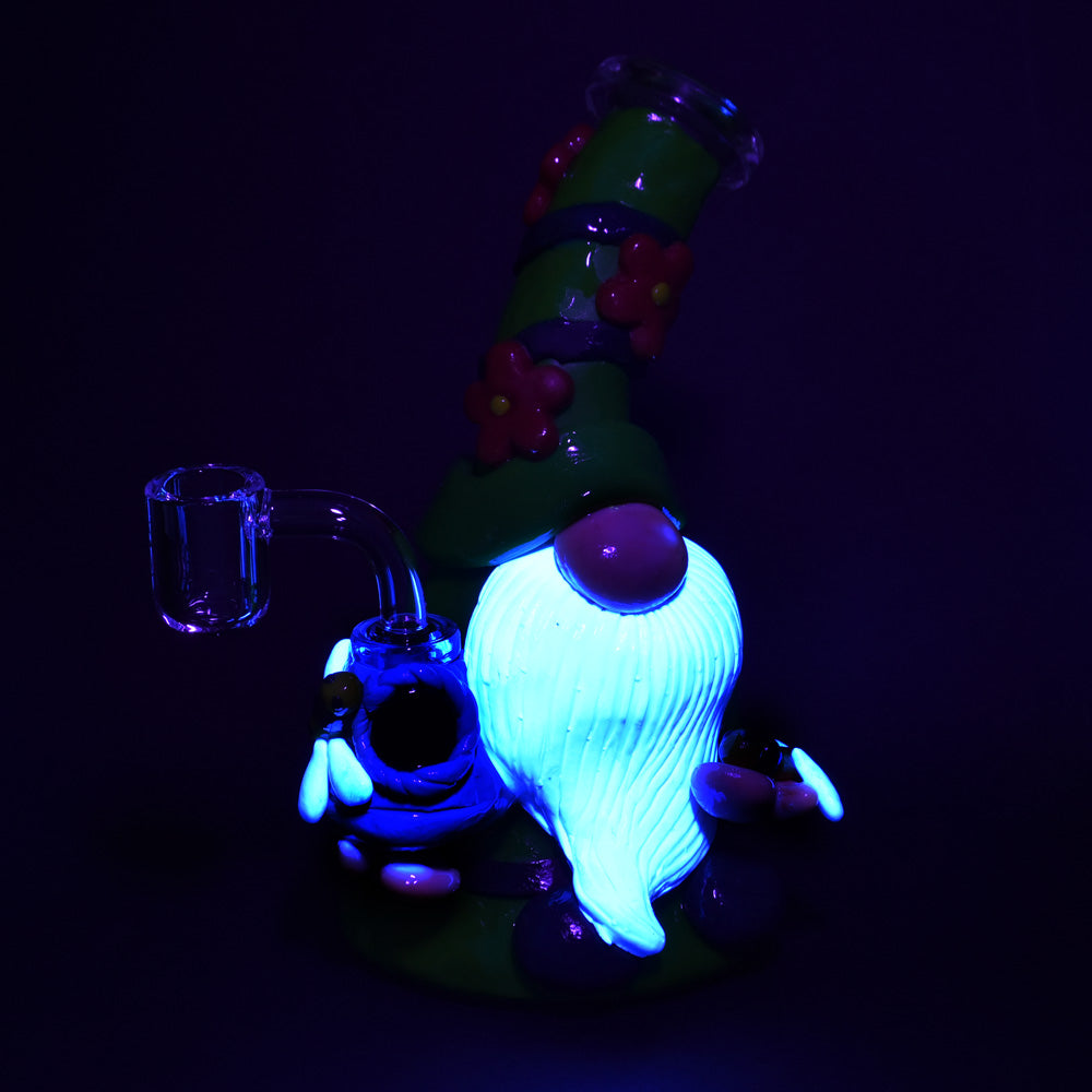 Flower Gnome glass and enamel dab rig with UV reactive accents under blacklight