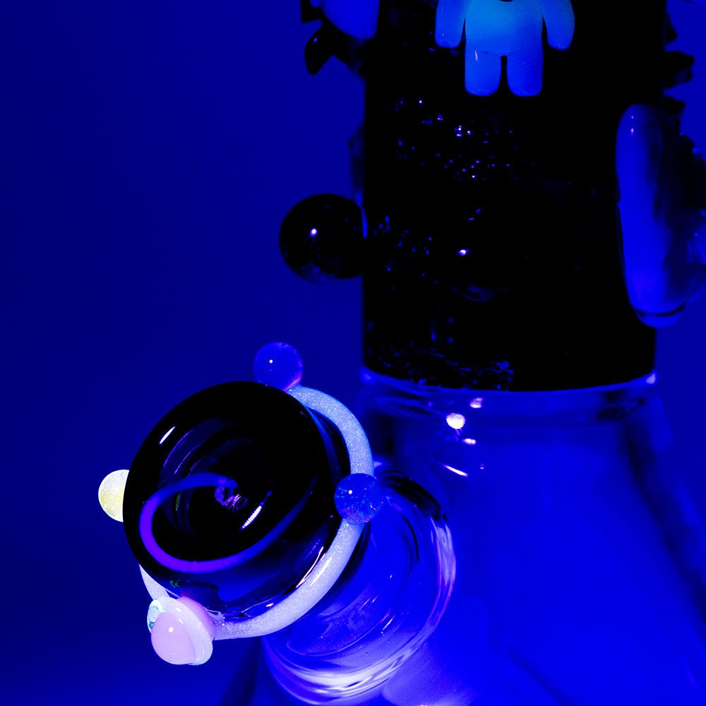 Galactic Baby Beaker bong glowing in the dark