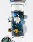 Ice catcher detail of Galactic Baby Beaker glow-in-the-dark glass bong