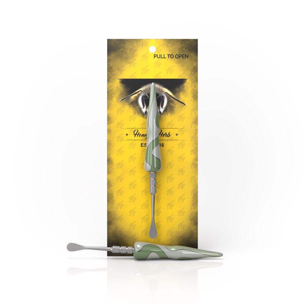 Hand-Blown Swirl Tide Dab Tool in Green with packaging