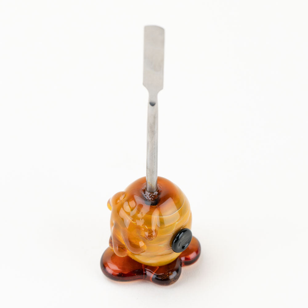Top view of Honey Dab Concentrate Tool highlighting lampwork handle and metal dabber tip