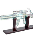 Machine Gun Glass Water Pipe displayed on stand