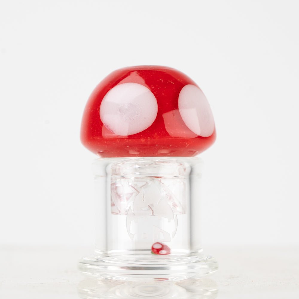 Front view of Mushroom Spinner Cap on quartz banger