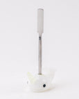 Side view of Radioactive Narwhal Wax Tool showing metal dabber tip and sculpted narwhal handle