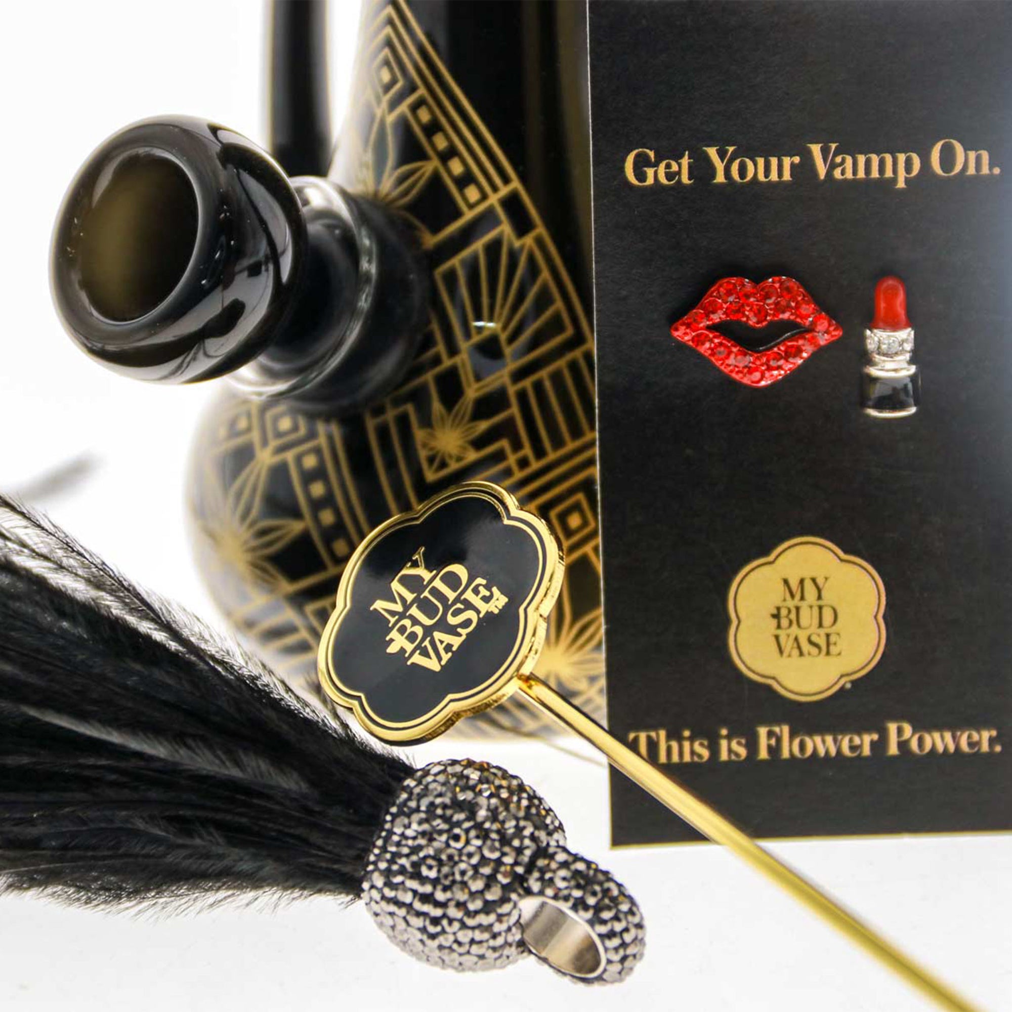 Full set of Vamp Vase Bong accessories including bubble bowl, joint poker, feather amulet, and earrings